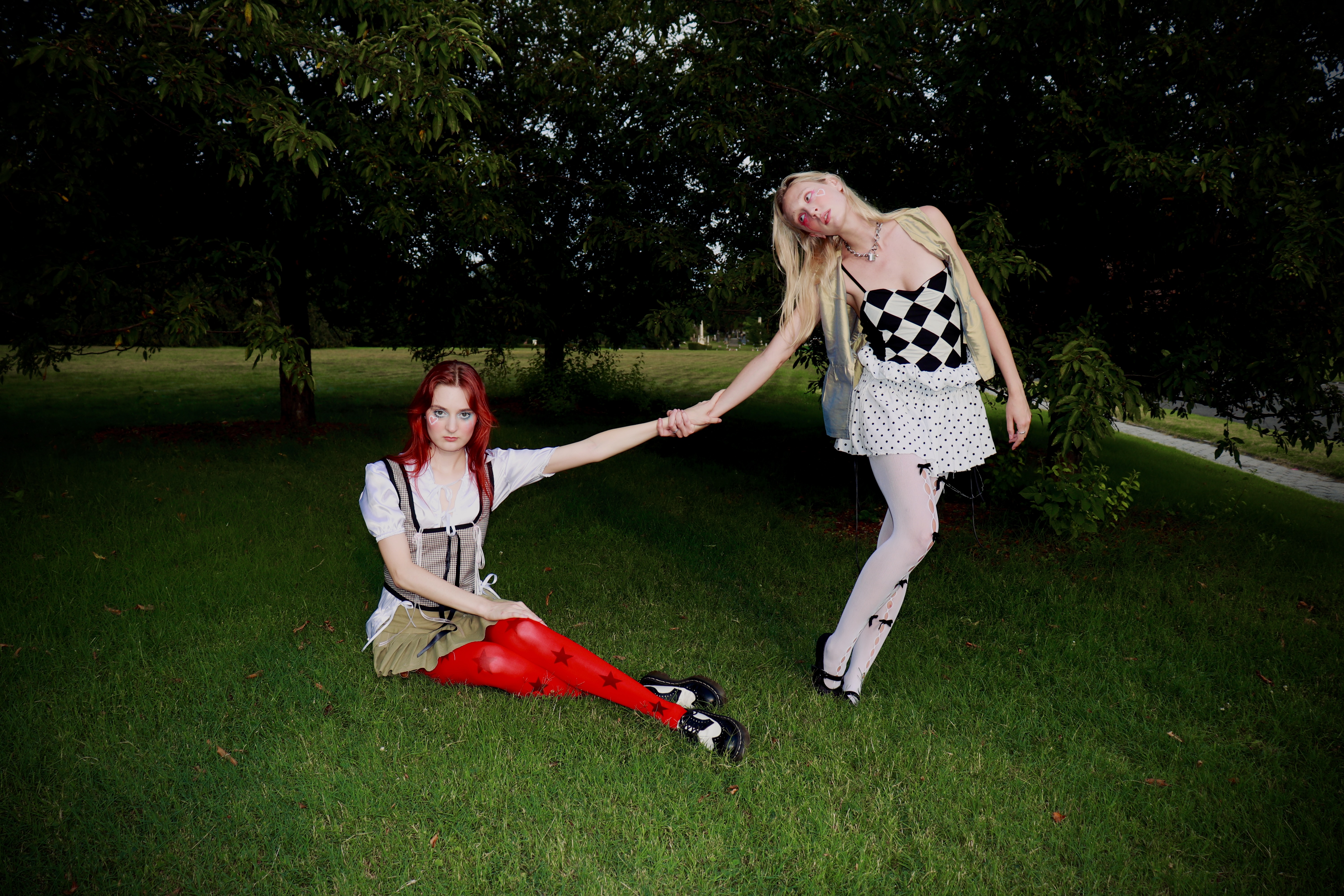 Sour Dice designs styled together on a studio backdrop